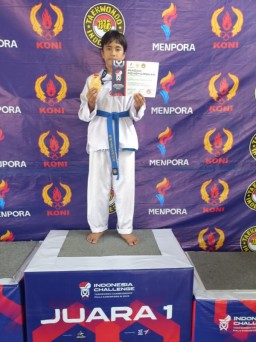 Rafardan, Bocah MI dari Plumpungrejo Sabet Emas di Kejuaraan Nasional Taekwondo Piala Menpora 2025