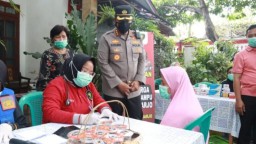 Polresta Sidoarjo Gelar Pengobatan Gratis dan Bansos Warga Kurang Mampu