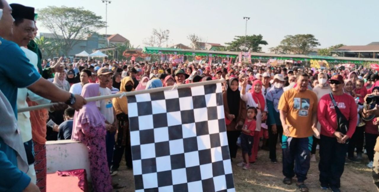 Pemberangkatan jalan sehat ber hadiah umroh. (ist)