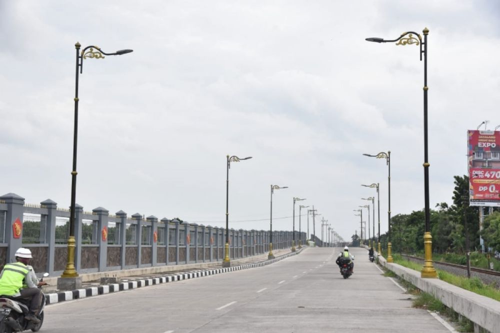 Jalan frontage road Aloha-Gedangan yang sudah selesai pembangunannya. (Ist) 
