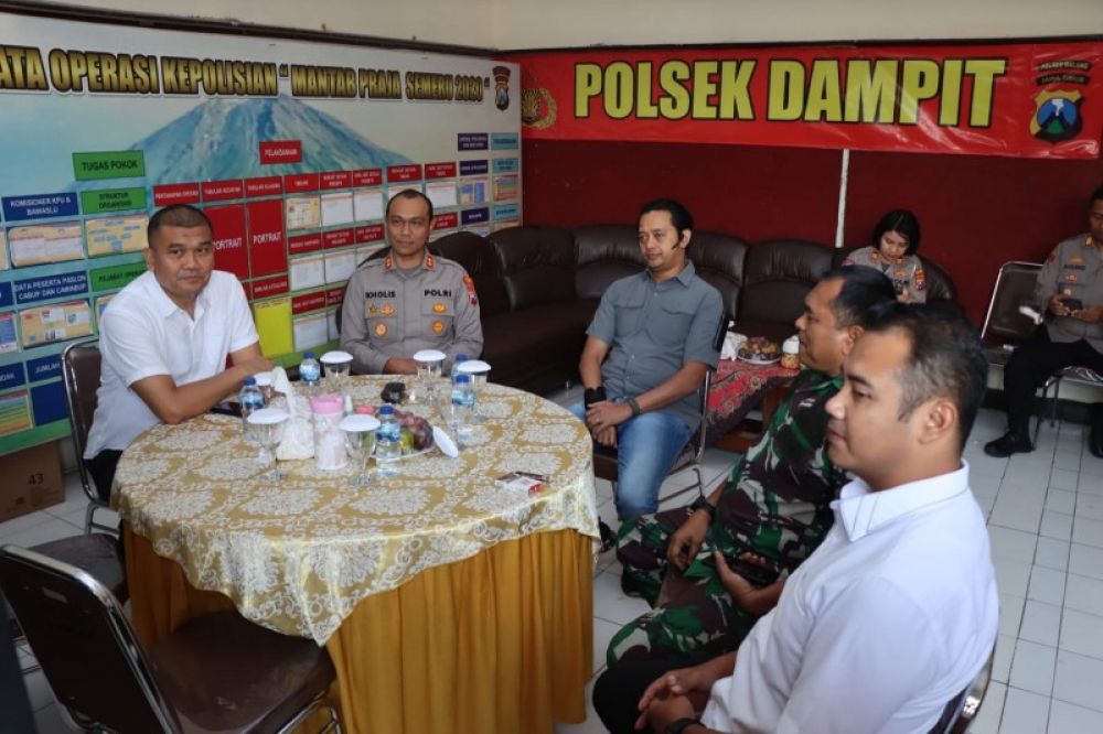 Kapolres dan Bupat Malang Sanusi rskoor pelaksanaan Pilkades serentak. (Ist) 